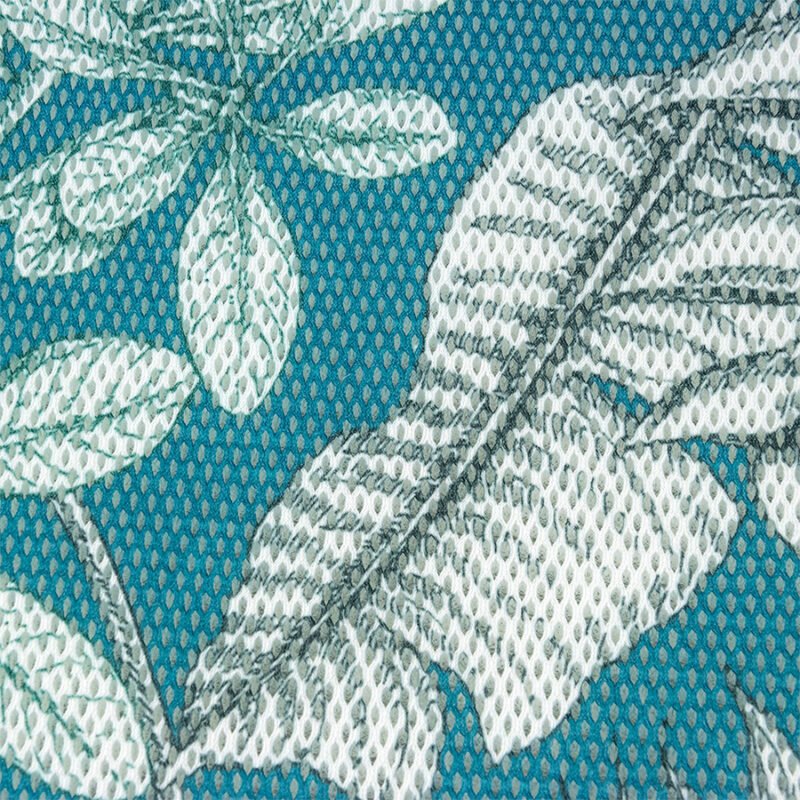 Poduszka dekoracyjna ogrodowa w liście tropikalne niebieskie - zbliżenie